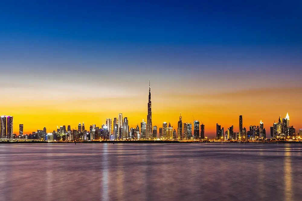 Dubai skyline with Burj Khalifa at sunset city view