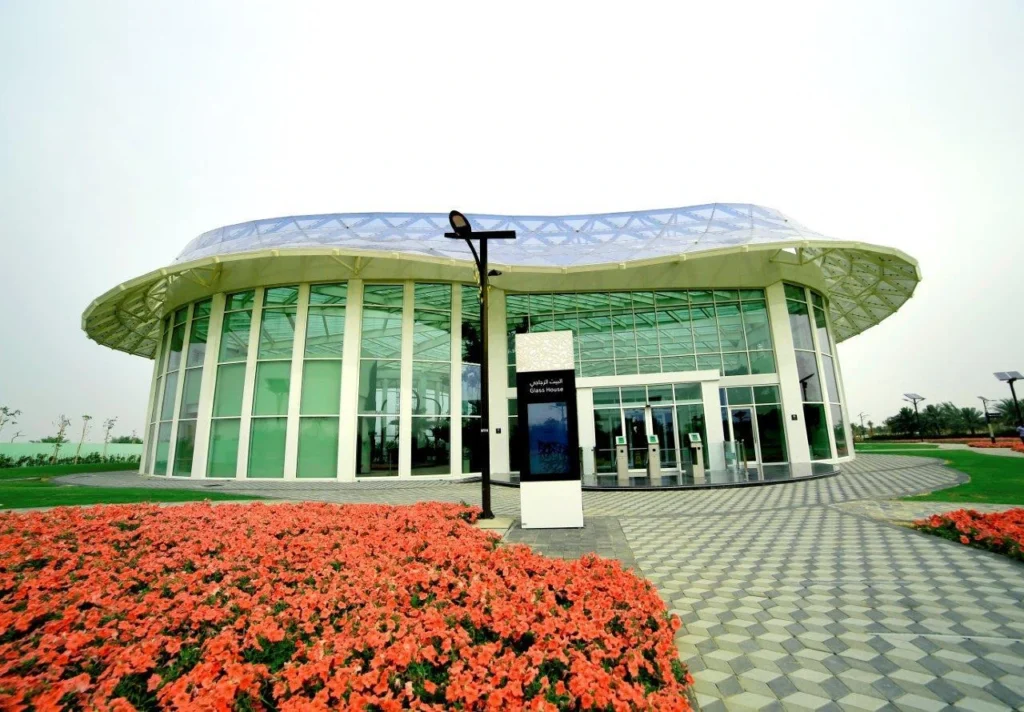 Glass House Dubai, Quranic Park greenhouse, botanical garden UAE, Quranic plants, olive trees, date palms, greenery, nature experience Dubai, eco park Dubai